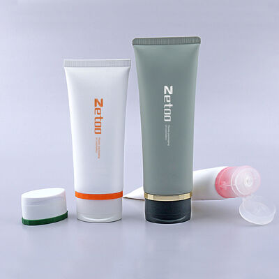 Un buon prezzo. 70ml - 180ml Tubi per protezione solare in plastica, grigio/bianco, con tappi a flip-top in linea