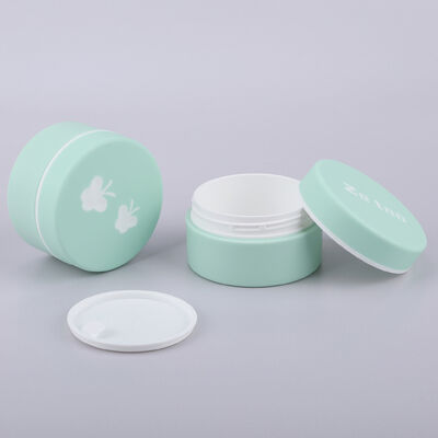 Buen precio Jarrón de crema verde / rojo de 50 ml Contenedor de crema de plástico de toque suave con tapa con patrón de mariposa en línea